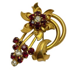 Vintage gold tone ruby red rhinestones  flower brooch
