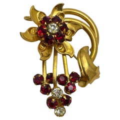 Vintage gold tone ruby red rhinestones  flower brooch