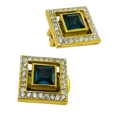 Vintage gold tone sapphire blue rhinestone designer clip on earrings