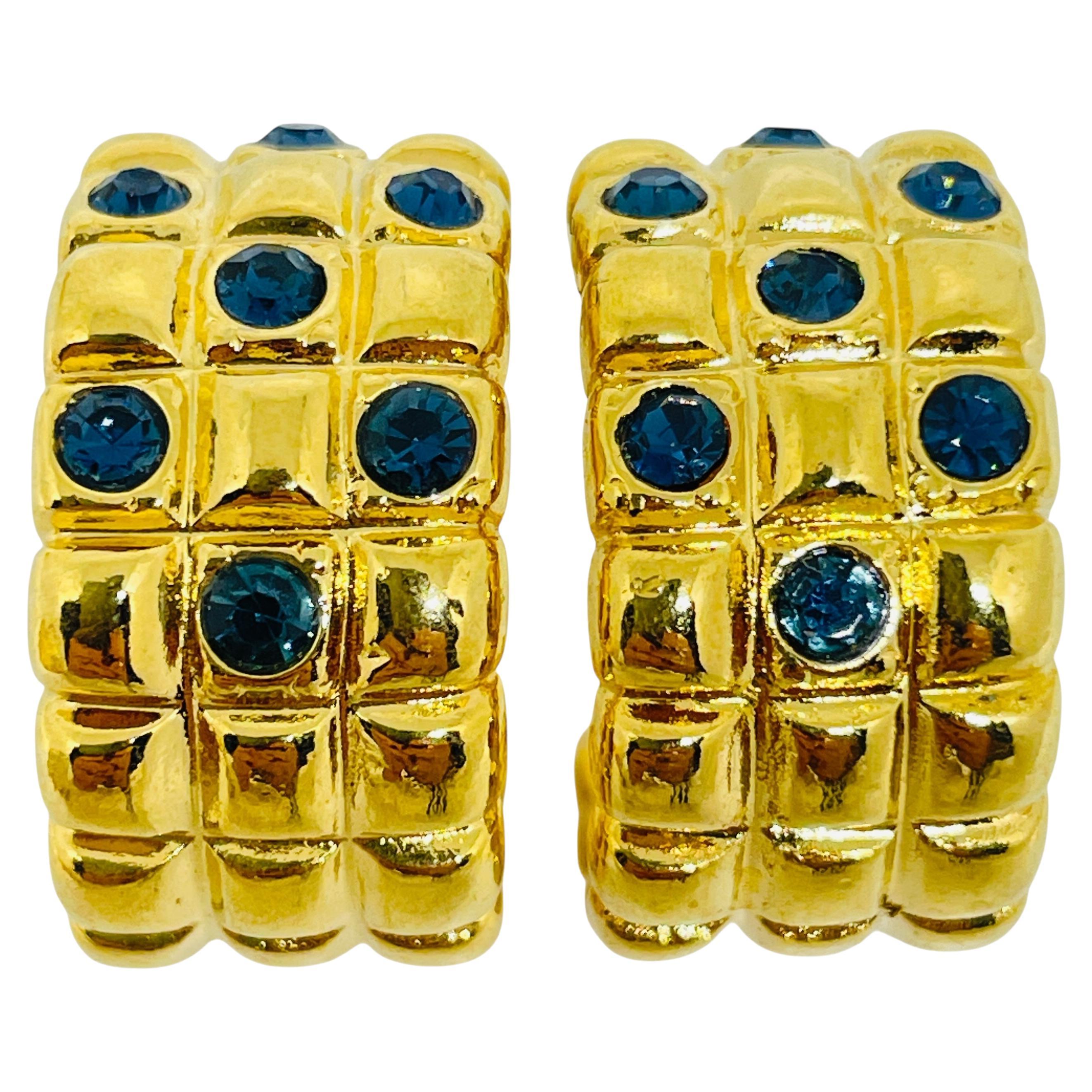 Orecchini a perno d
oro vintage con strass e zaffiri di design