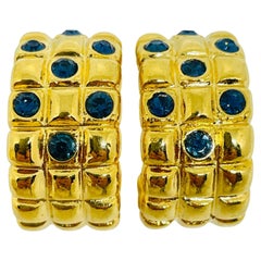 Orecchini a perno d
oro vintage con strass e zaffiri di design