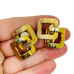 Vintage gold tone shiny textured modernist 80's designer clip on earrings