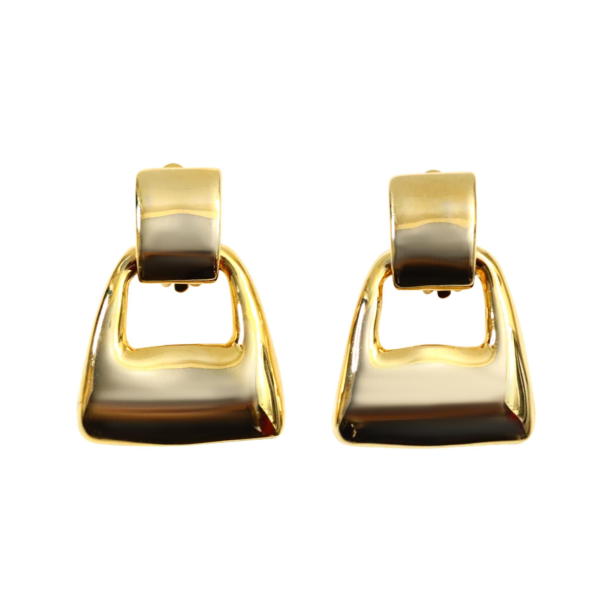 Vintage Gold Tone Square Dangling Earrings Circa 1980s.  These are always classic earrings that look great and elevate an outfit to the next level, pairing perfectly with a white blouse, jeans, or a navy blazer. Clip On

These have no curb appeal,