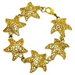 Vintage gold tone starfish designer bracelet