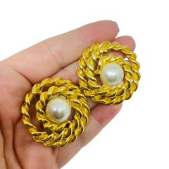 Vintage gold tone swirl faux pearl designer 80's clip on earrings