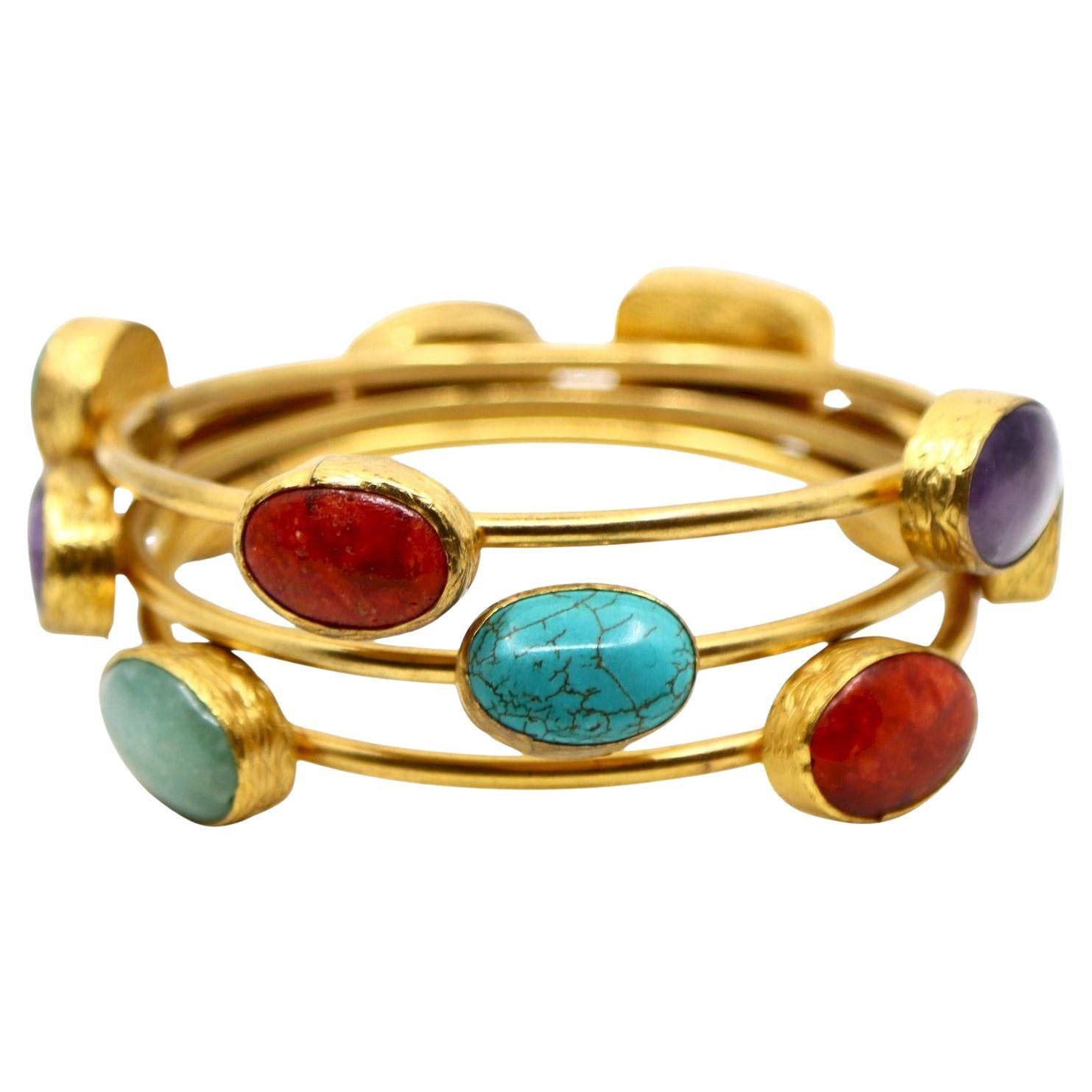 Braccialetto vintage con tre stand e pietre miste in tonalità oro