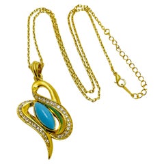 Collar vintage de diseño con strass turquesa en tono dorado