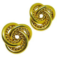 Vintage gold tone twisted knot designer pierced earrings
