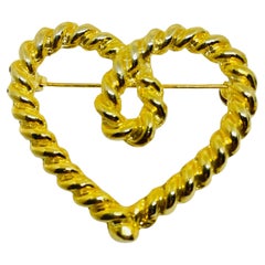 Vintage gold tone twisted rope heart designer brooch