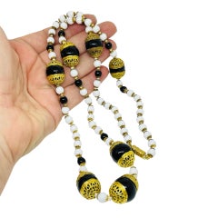 Vintage gold tone white black glass beaded designer necklace