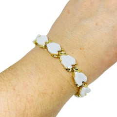 Vintage gold tone white thermoset leafs designer link bracelet