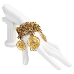 Bracelet Vintage en or avec de larges disques suspendus, circa 1980