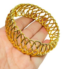 Vintage gold tone wide designer bangle bracelet