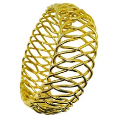 Vintage gold tone wide designer bangle bracelet