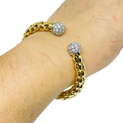 Bracelet manchette flexible vintage en or avec strass
