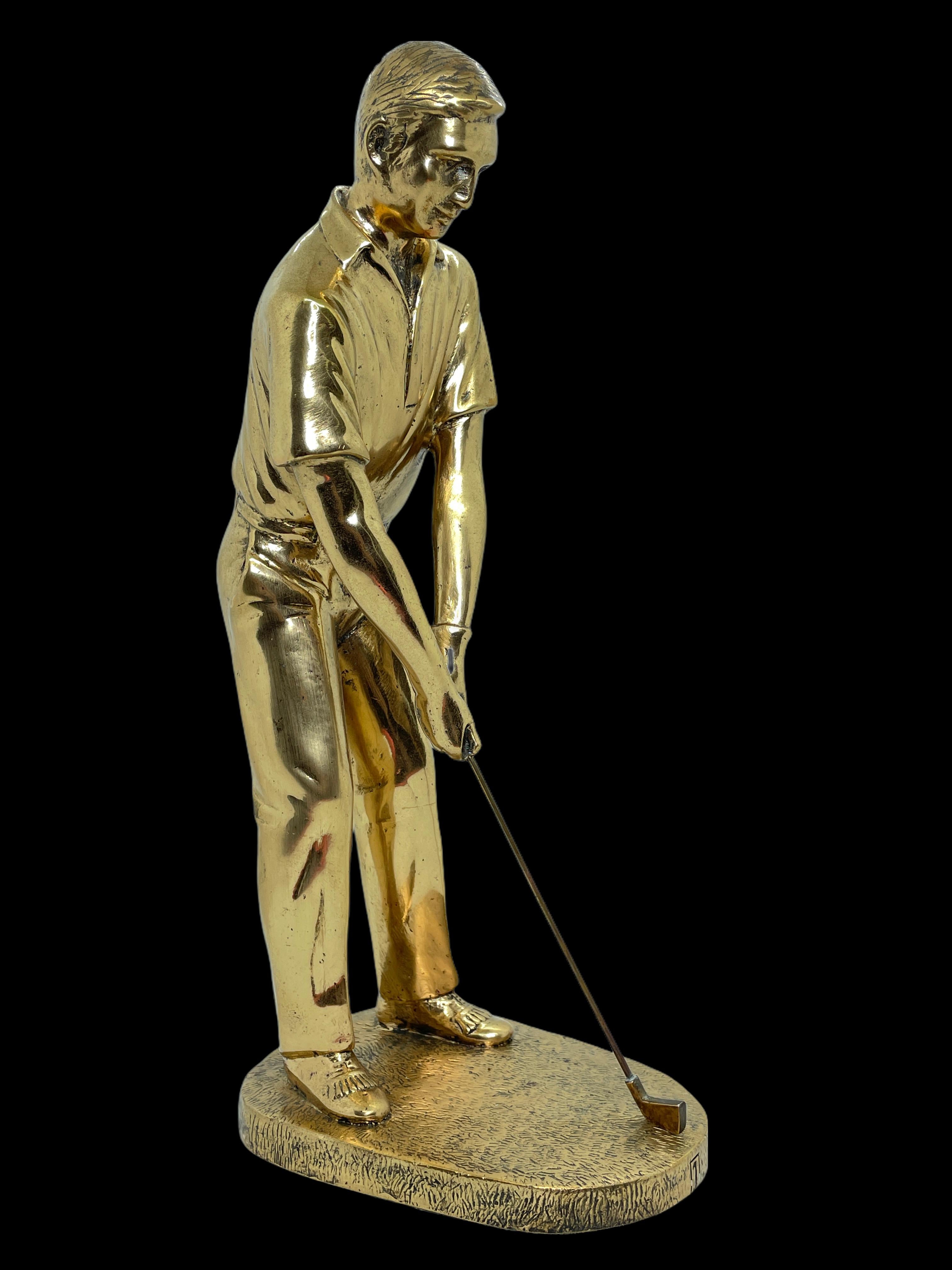 A classic decorative Golf statue. Some wear with a nice patina, but this is old-age. Dressed in vintage 1960s clothes, the pensive golfer stares down to the ball before completing the perfect swing; inscribed I.. Very decorative and nice to display