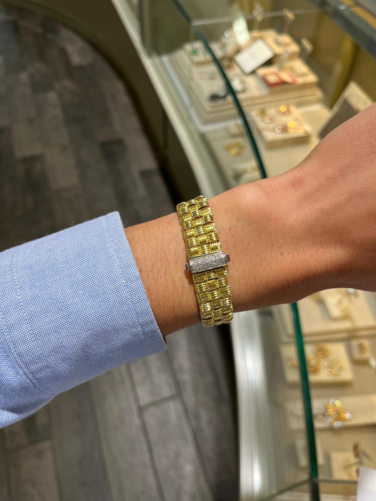 A very popular design at the time of its inception and still today, the Roberto Coin Appasionata bracelet is one of Coin's most highly regarded designs because of its luxuriously woven 18 karat gold which fits comfortably to the wrist, its subtle