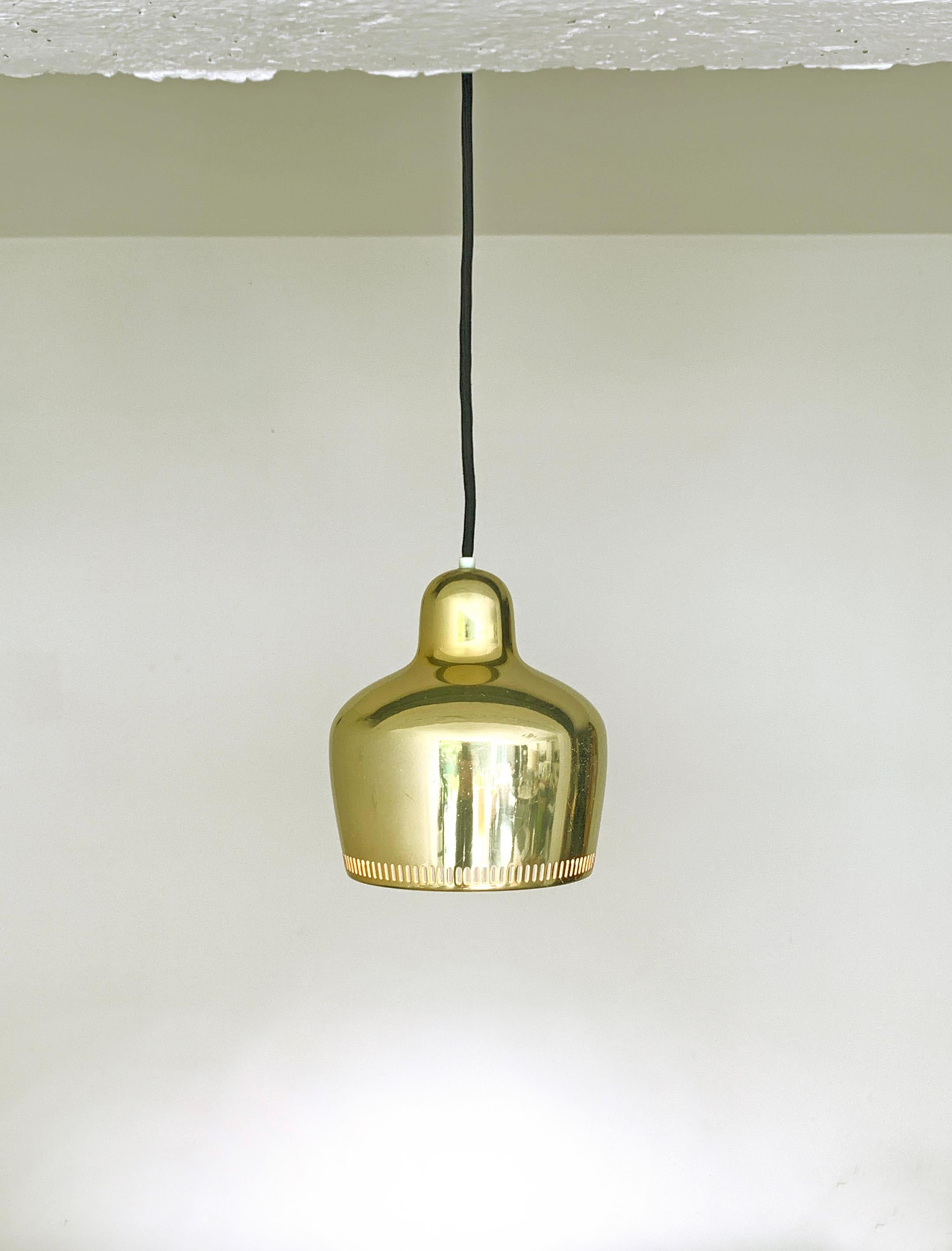 The 'Golden Bell' pendant lamp was designed in 1936 for the interior of the Savoy restaurant in Helsinki by Alvar and his wife Aino Aalto. It was characteristic of Aalto to treat each building as a complete work of art, right down to the furniture