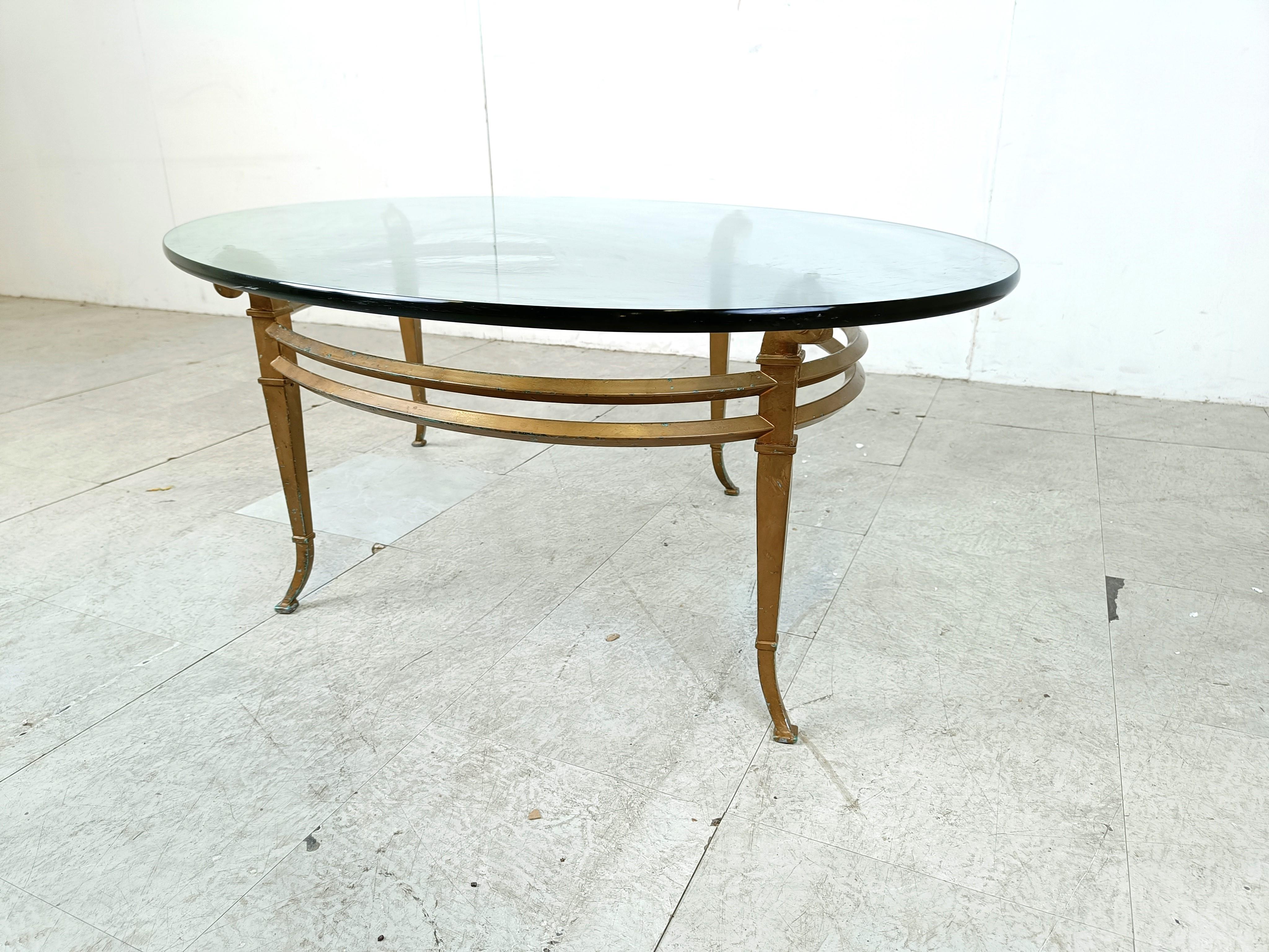 Vintage golden metal and oval glass coffee table, 1970s For Sale 3