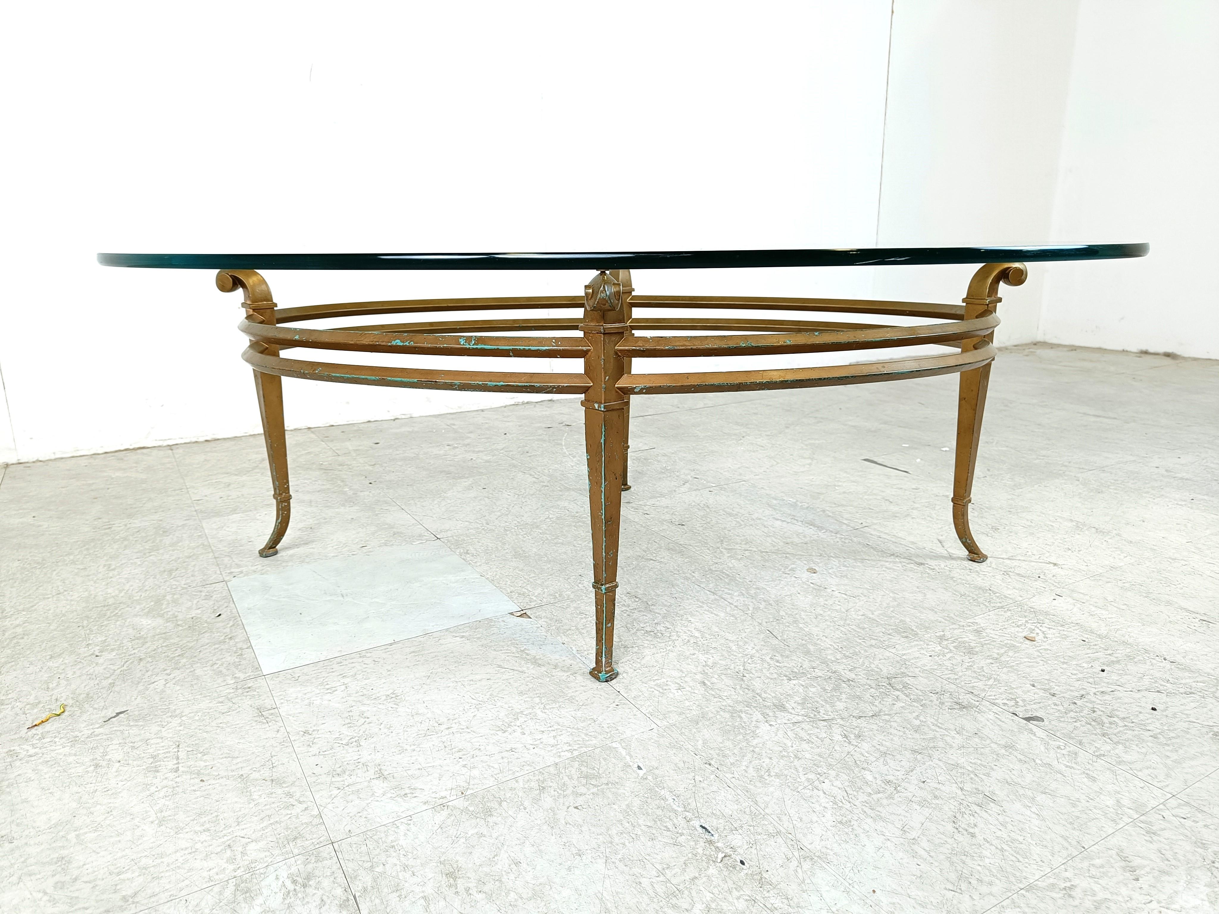 Late 20th Century Vintage golden metal and oval glass coffee table, 1970s For Sale