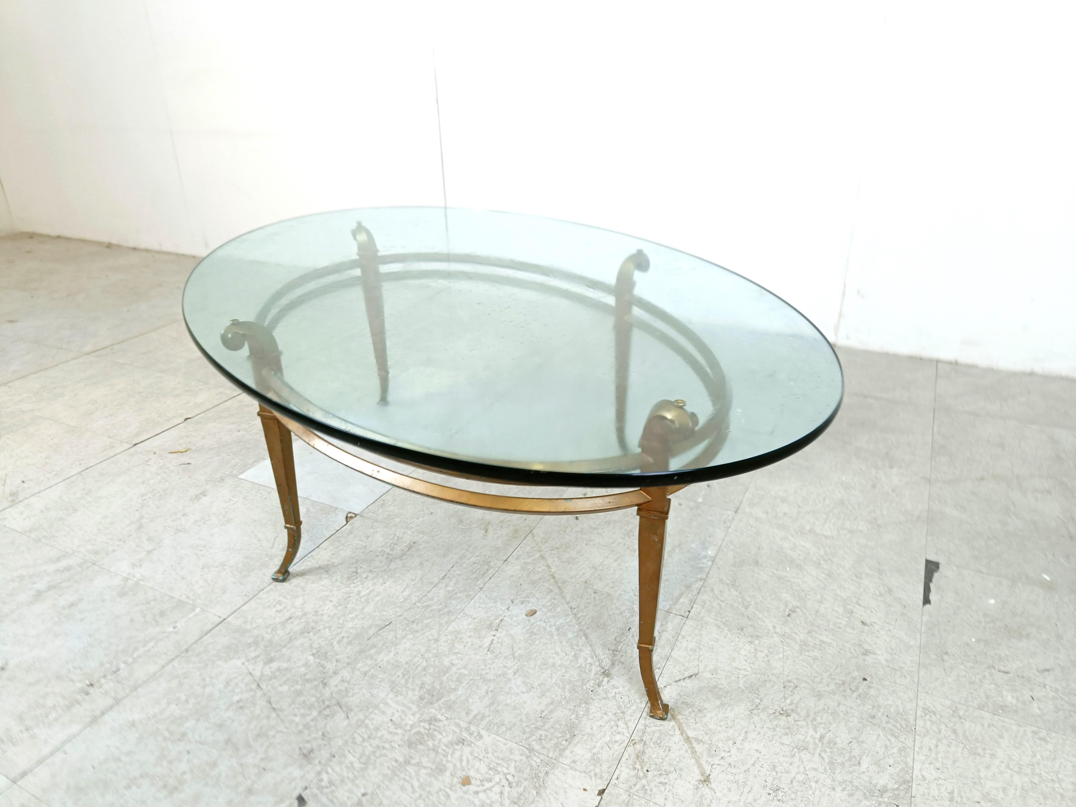 Vintage golden metal and oval glass coffee table, 1970s For Sale 2