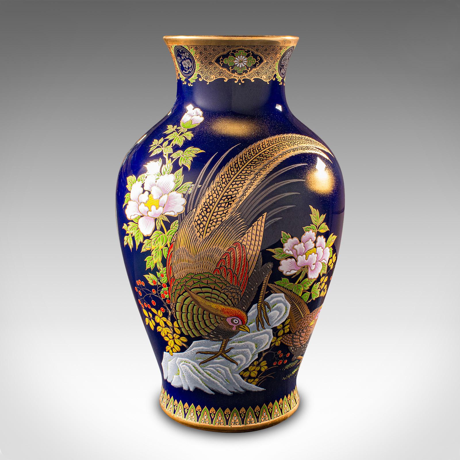 This is a vintage pheasant vase. A Chinese, lacquer ceramic baluster urn, dating to the late 20th century, circa 1980.

Superb baluster vase with a striking decorative finish
Displaying a desirable aged patina and in good order
Deep cobalt blue