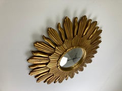 Vintage golden sunburst mirror