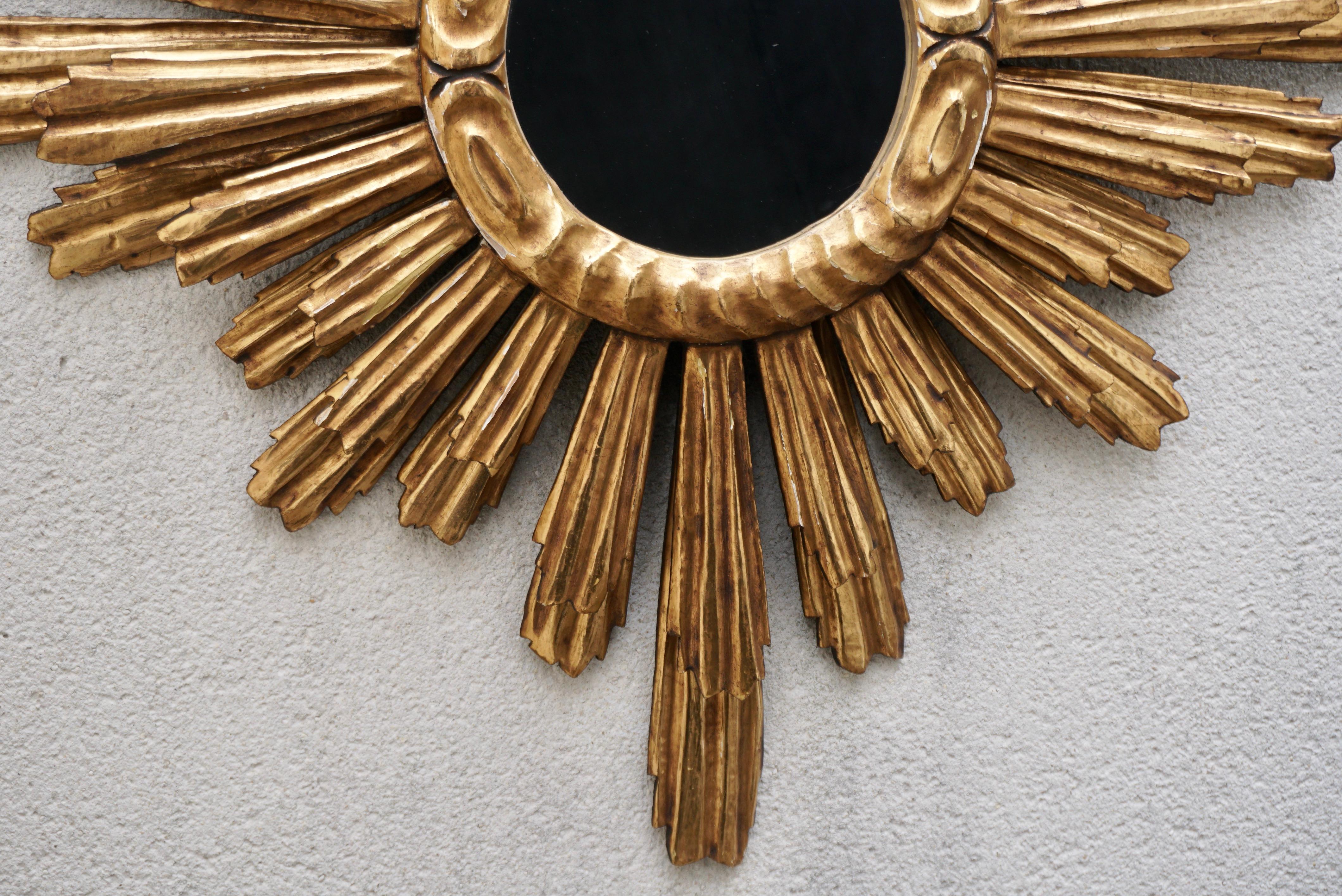 Carved Vintage Golden Sunburst Mirror in Gilded Wood 1960s For Sale