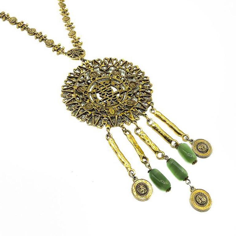 medallion necklaces 1960s