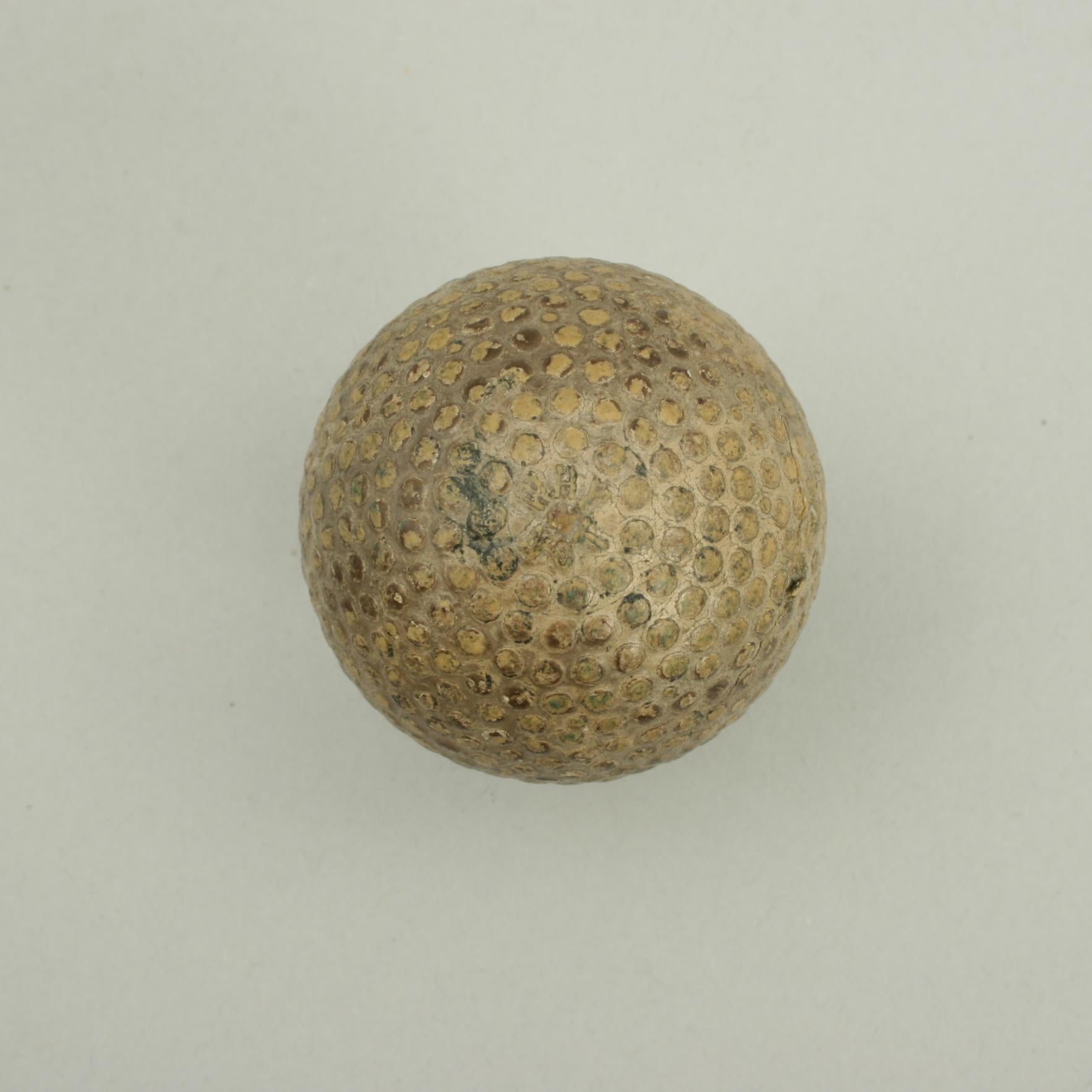 'WHY NOT' Bramble Golf Ball.
A bramble patterned rubber core golf ball manufactured by Henley's Telegraph Works Co., also known as the Henley's Tyre & Rubber Co. Ltd. London, England. The ball has 'Why Not' on both poles with a moulded bramble