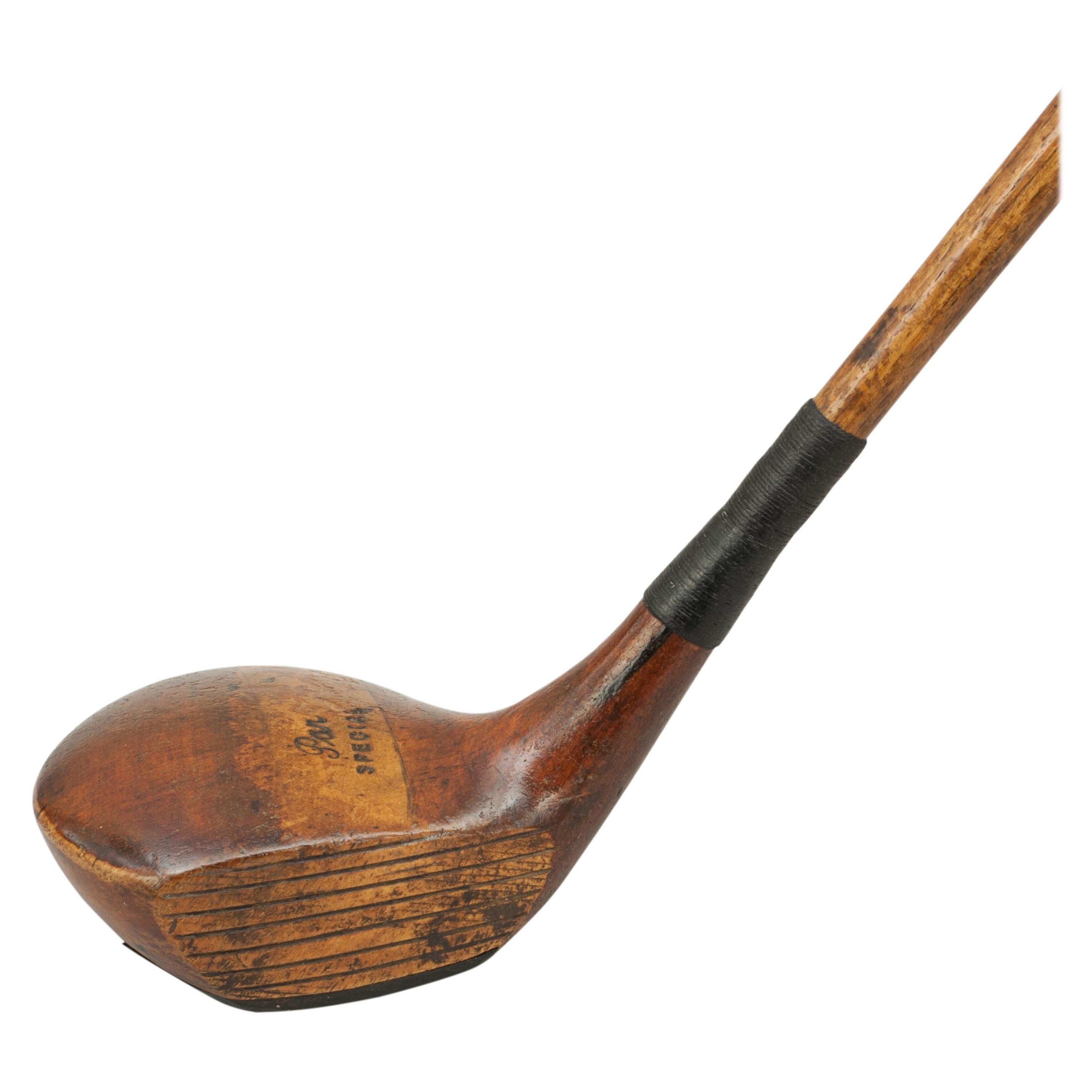 Hickory Shafted golf club, 'Par' driver.
A good original persimmon wood socket head driver with hickory shaft and polished leather grip. The head marked 'Par' 'Special' with lead weight to the rear and extra lead in the sole. It has a face insert