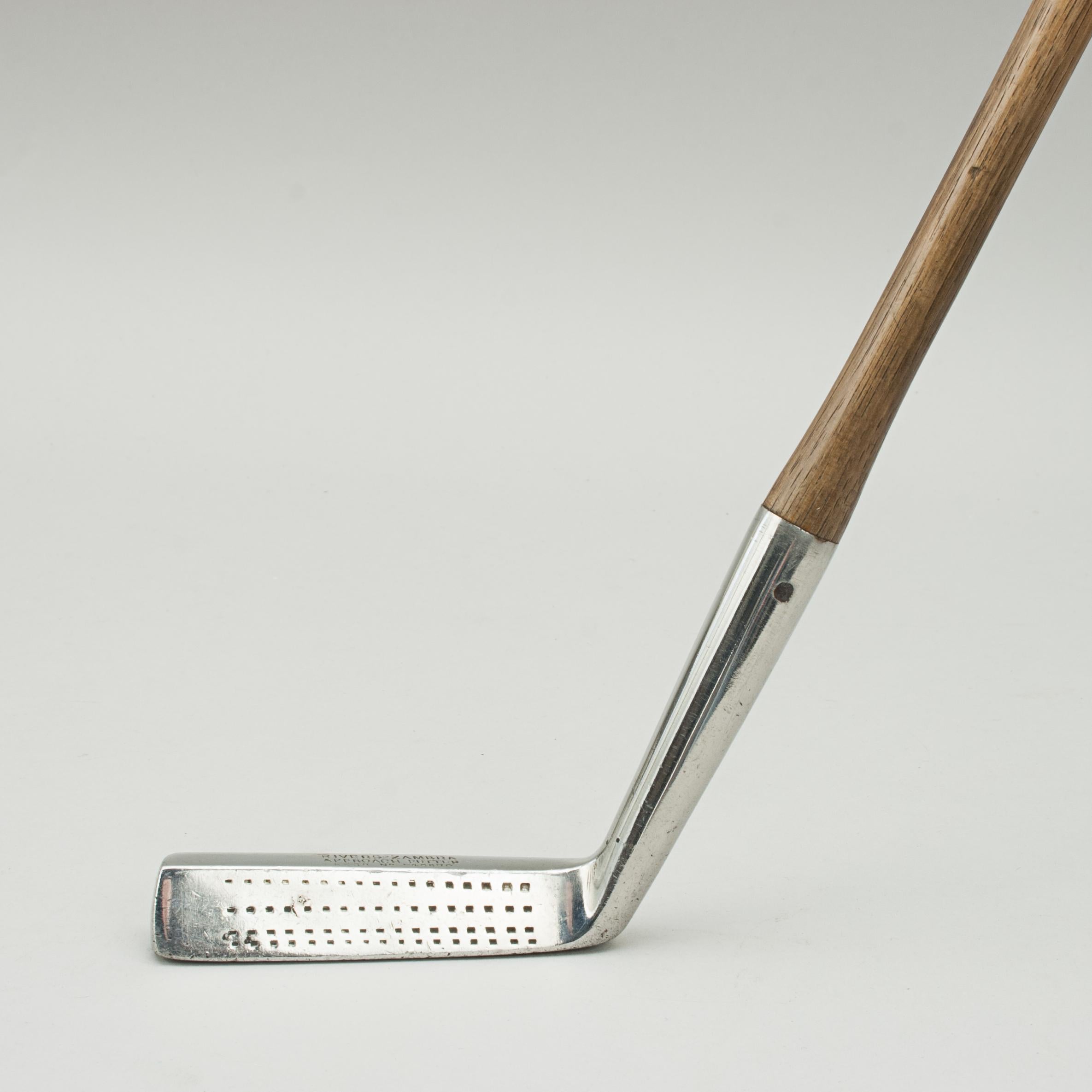 Hickory Shafted Golf Club, Rivers-Zambra Approach Putter.
A good original example of 'The Scuffler' by the Stadium Golf Co. This is an unusual chipper with a unique head shape having a low profile blade with 25° lofted face, with the face, crown,