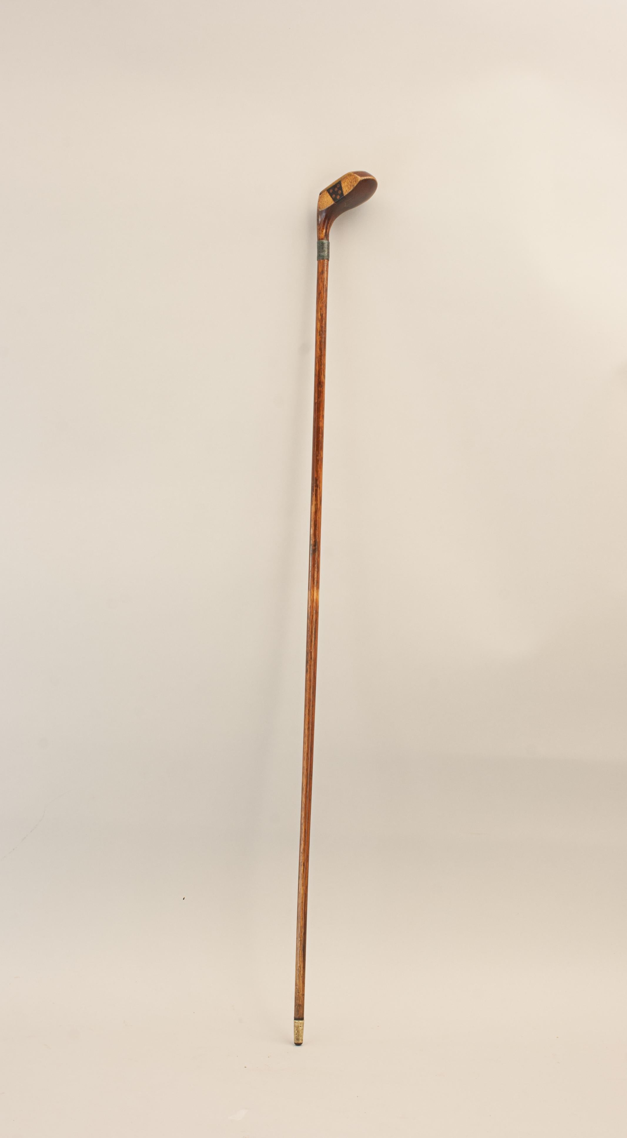 Antique Sunday Club, Golf Club walking stick.
A desirable walking cane with the handle in the shape of a golf club head. The gentleman's walking stick has a persimmon socket head handle with a pegged horn insert, face insert and a lead weight to