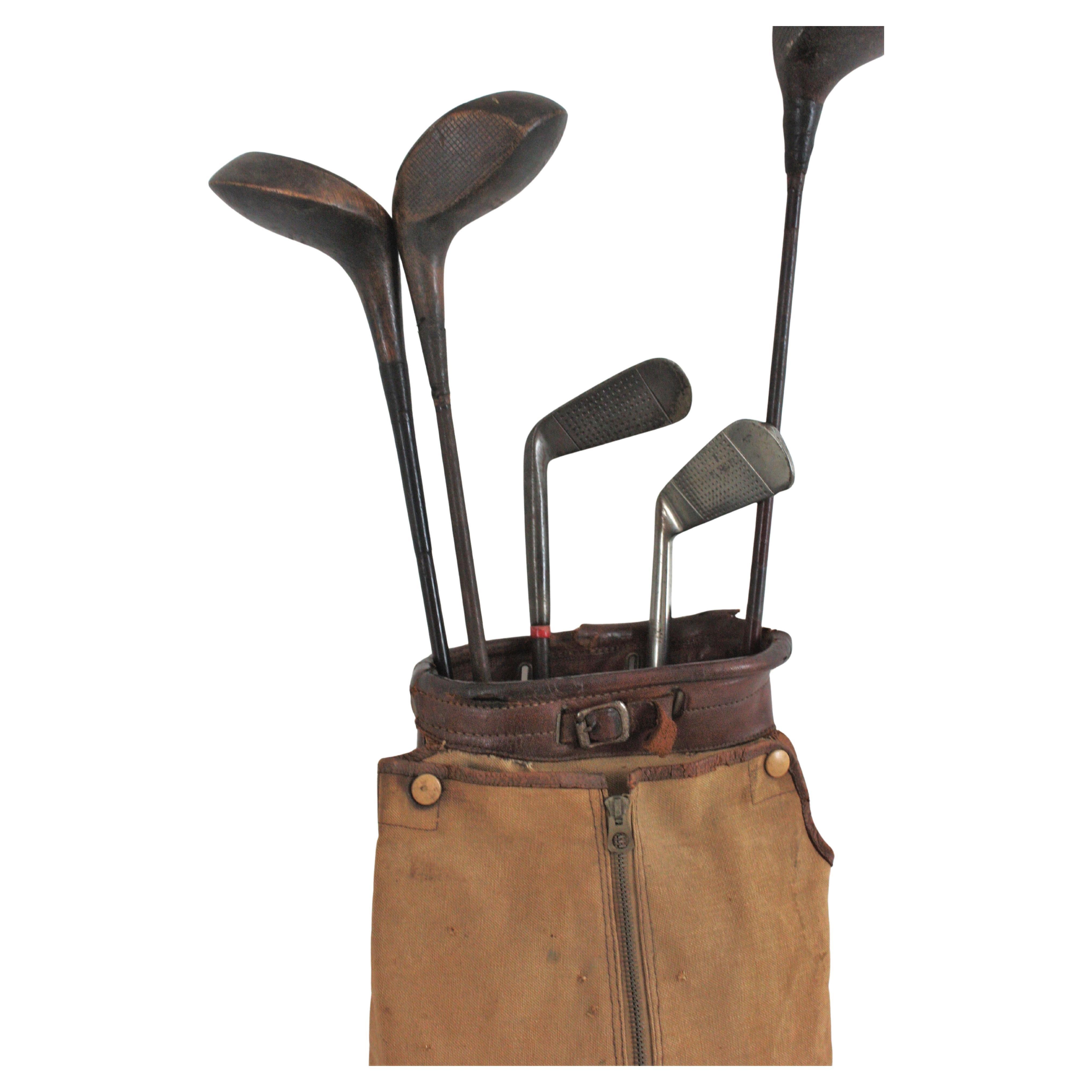 Set of Golf Bag and Clubs, 1930-1940.
Vintage Golf Set for Collectors.
Wooden Golf Walking Sticks, Sunday Clubs and Hickory Golf Clubs.
For decorative purposes or window dressings.
Original vintage condition: The clubs will be doubly beautiful after