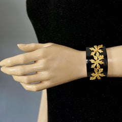 Vintage GOOSSENS PARIS Gilt Flower Overlay Black Acrylic Cuff Bracelet