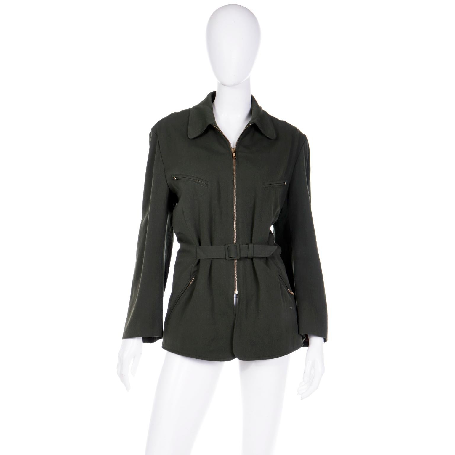 This great vintage Gordon Henderson army green wool jacket is so contemporary and it can be worn with numerous separates. This easy to wear jacket was made in Hong Kong in the late 1980's or early 1990's. There is a front gold metal zipper for