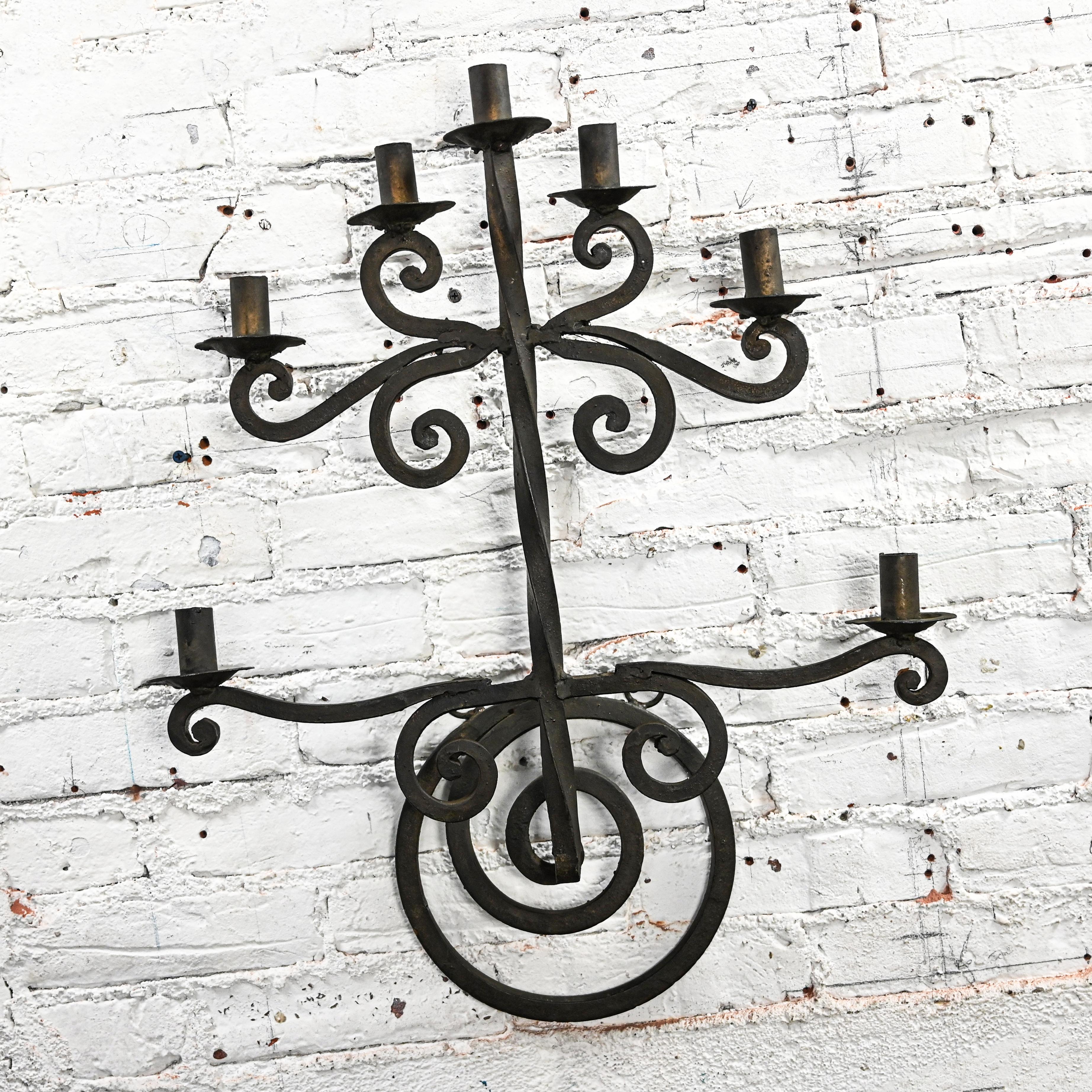 Awesome vintage Gothic or Spanish Revival handmade solid wrought iron black painted candelabra wall hanging made in Mexico. Beautiful condition, keeping in mind that this is vintage and not new so will have signs of use and wear even if it has been