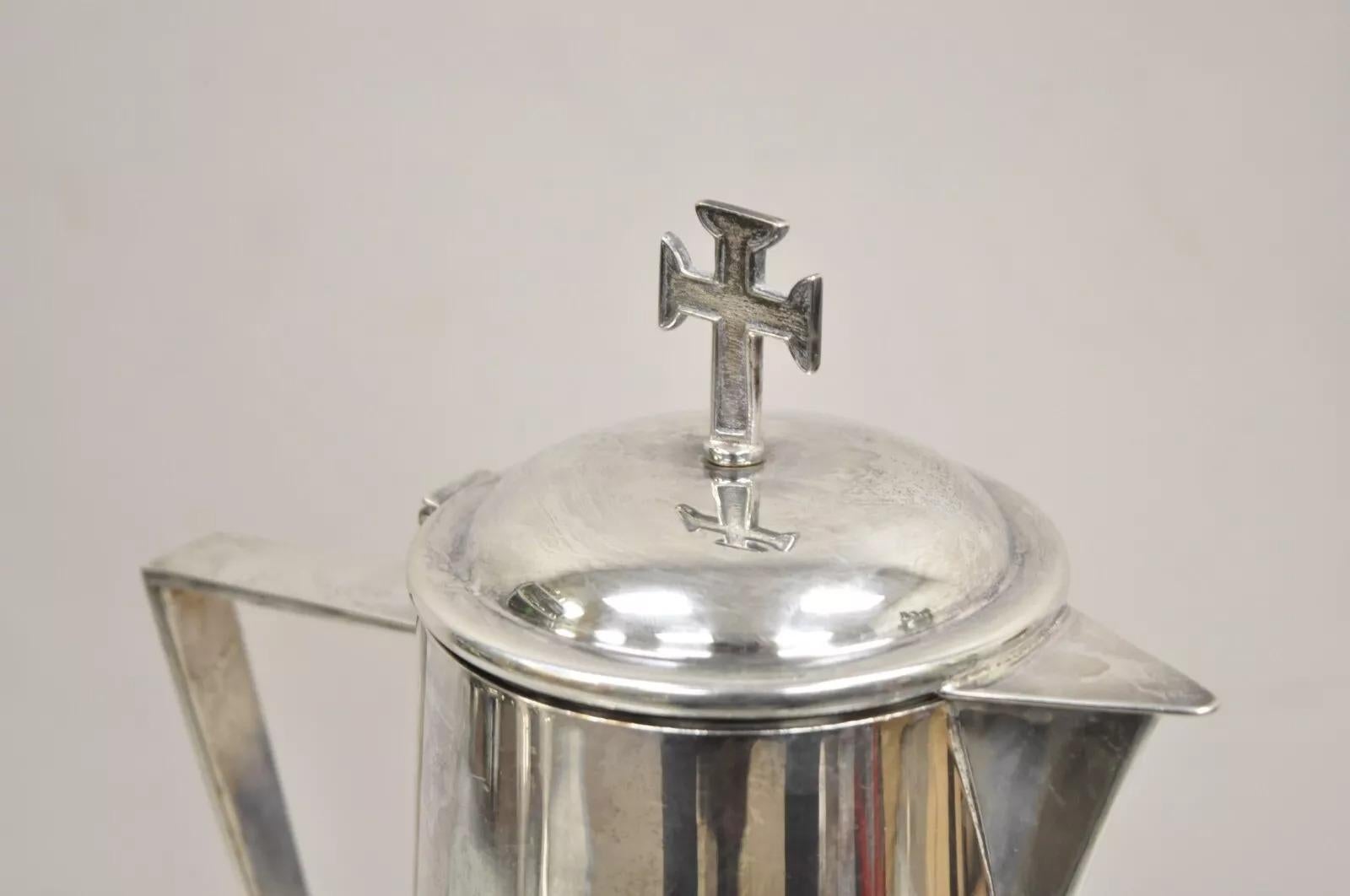 Vintage Gothic Style Religious Silver Plated Tall Church Pitcher with Cross Finial. Circa Mid 20th Century. Measurements: 14