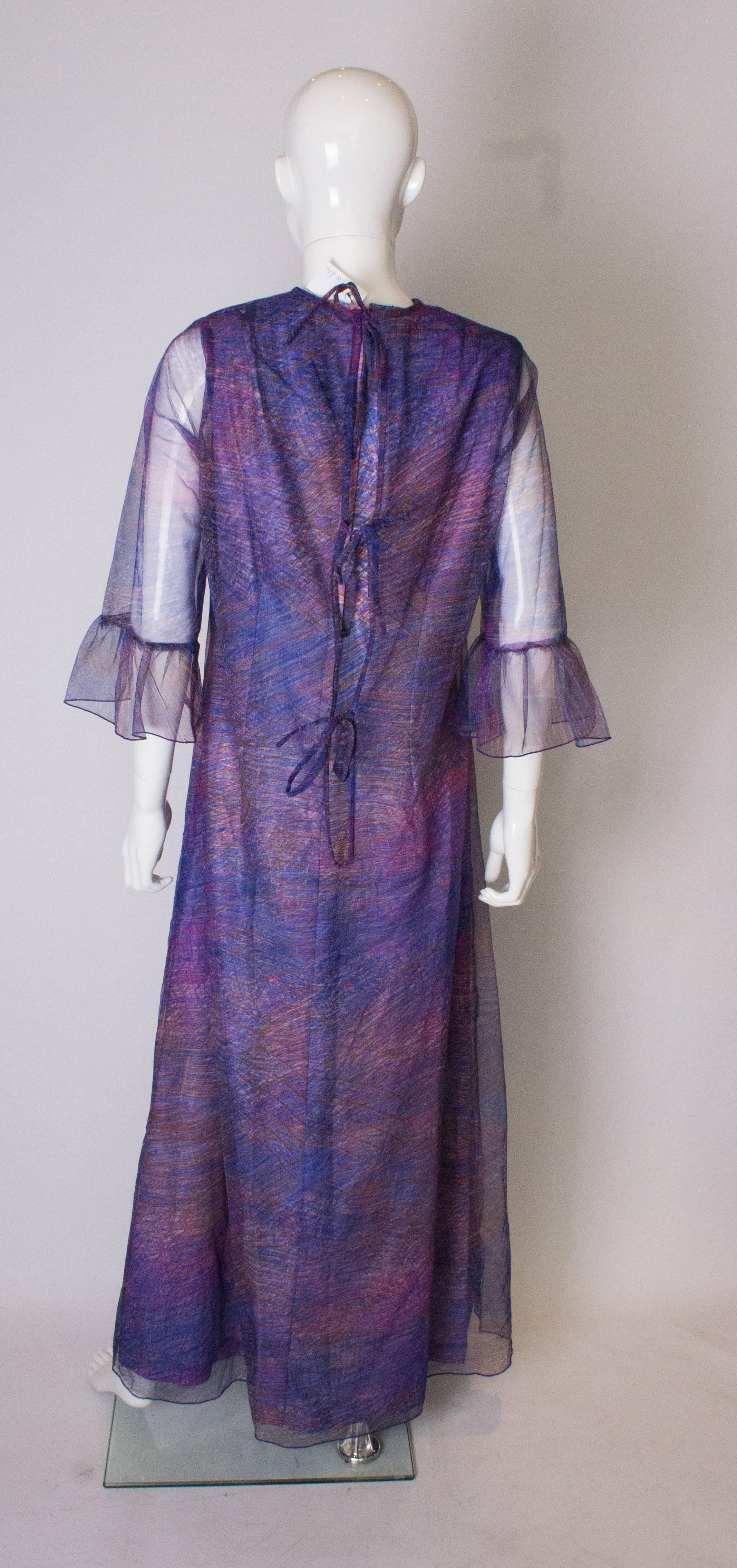 A vintage 1970s purple printed layered long party dress by Clive Byrne, London 1