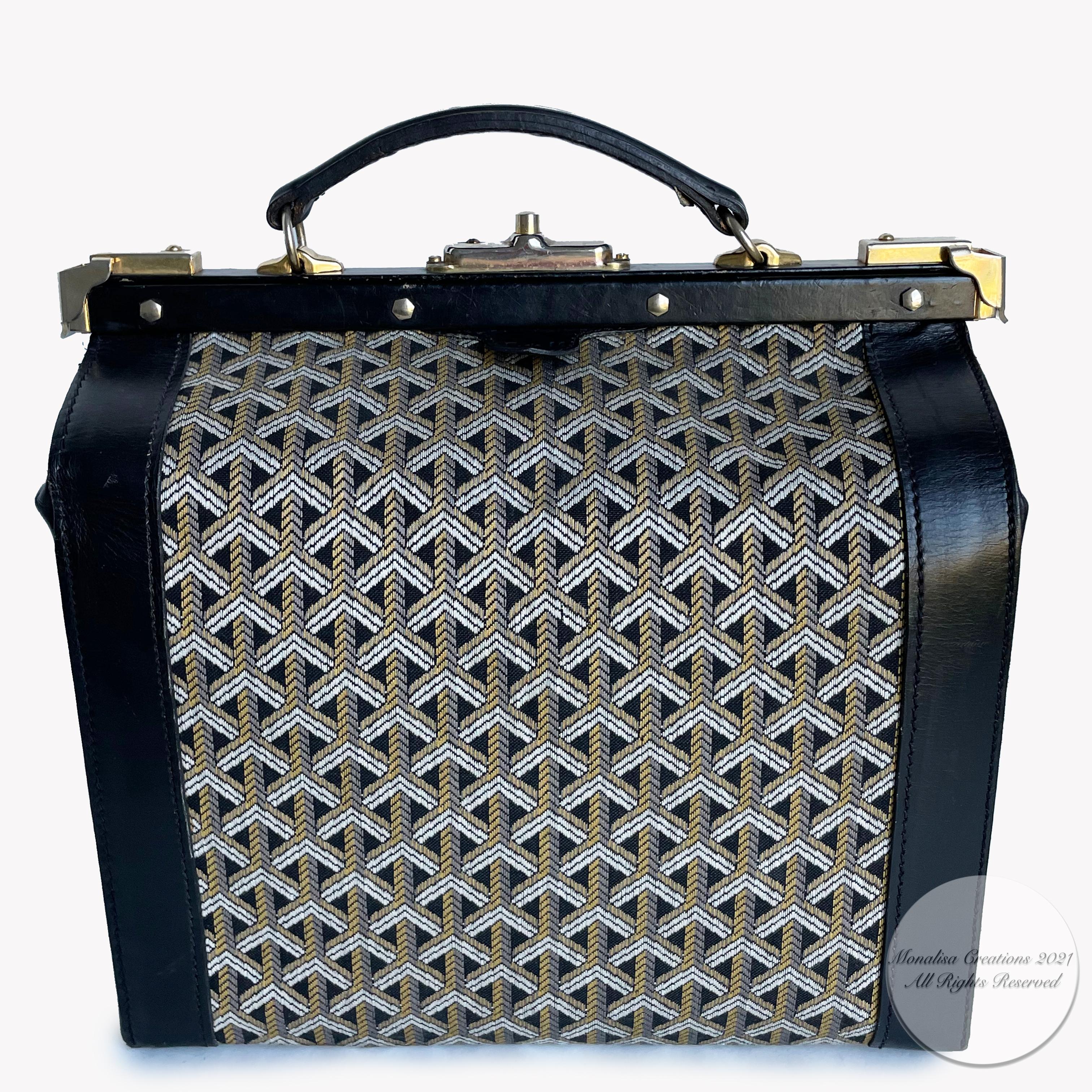 Authentic, preowned, vintage GOYARD train case, from the late 50s. Very cool Gladstone Doctors style bag!
Black leather trim/woven Goyardine fabric exterior & yellow silk interior. 
Push button lock fastener (no keys) w/side latches, allow one to