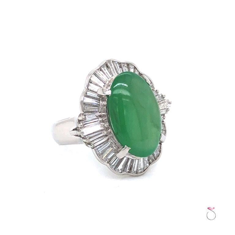 Magnificent vintage translucent grade A apple green Jadeite in platinum diamond ballerina ring. The gorgeous 5.967 carat center stone is a GIA certified natural grade A green Jadeite jade, Cabochon oval shape. The center Jade is surrounded by a