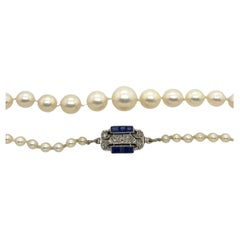 Collier vintage de perles de culture graduées avec diamants et saphirs