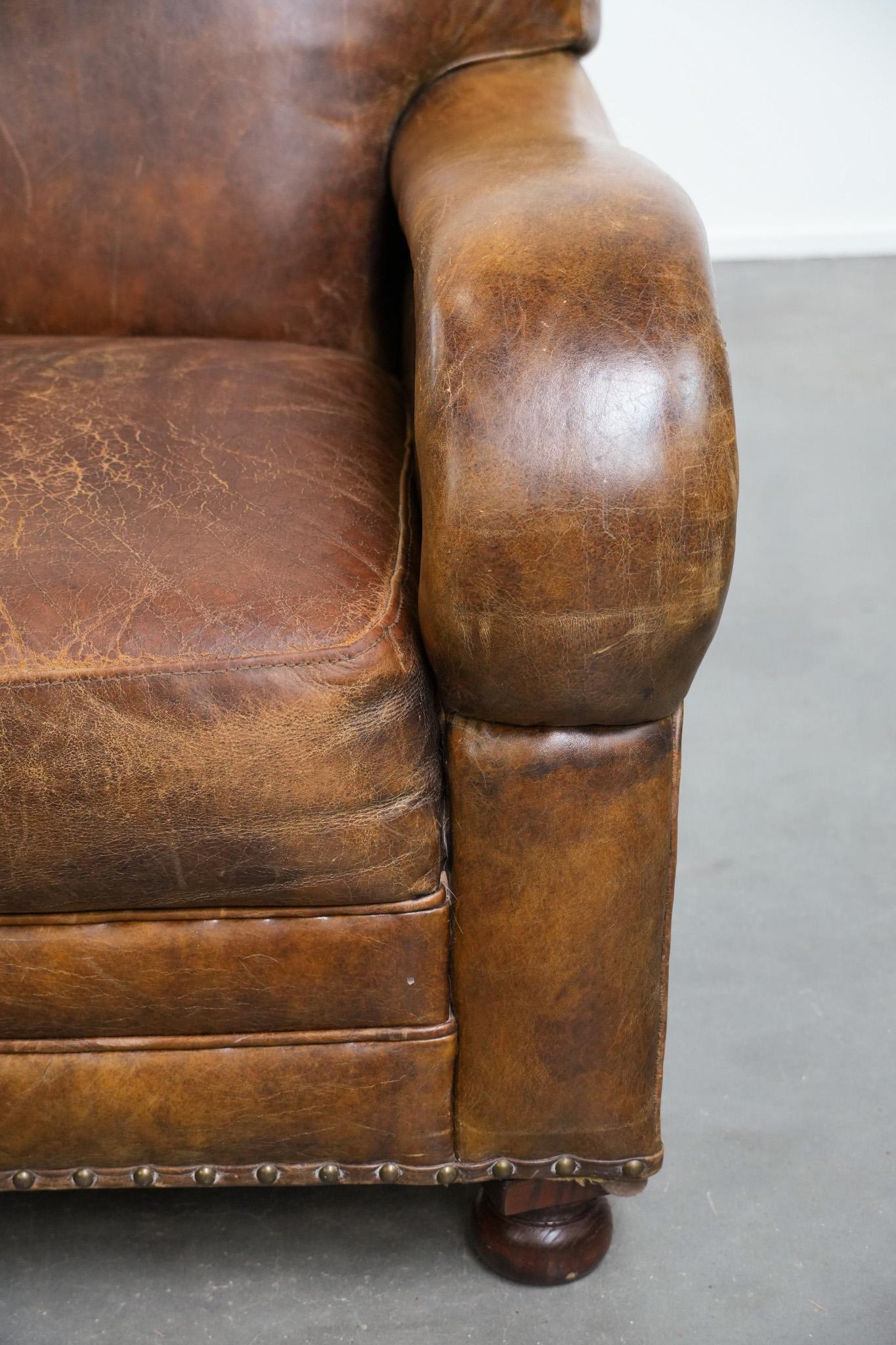 Vintage grained cowhide leather armchair with rounded shapes en vente 3