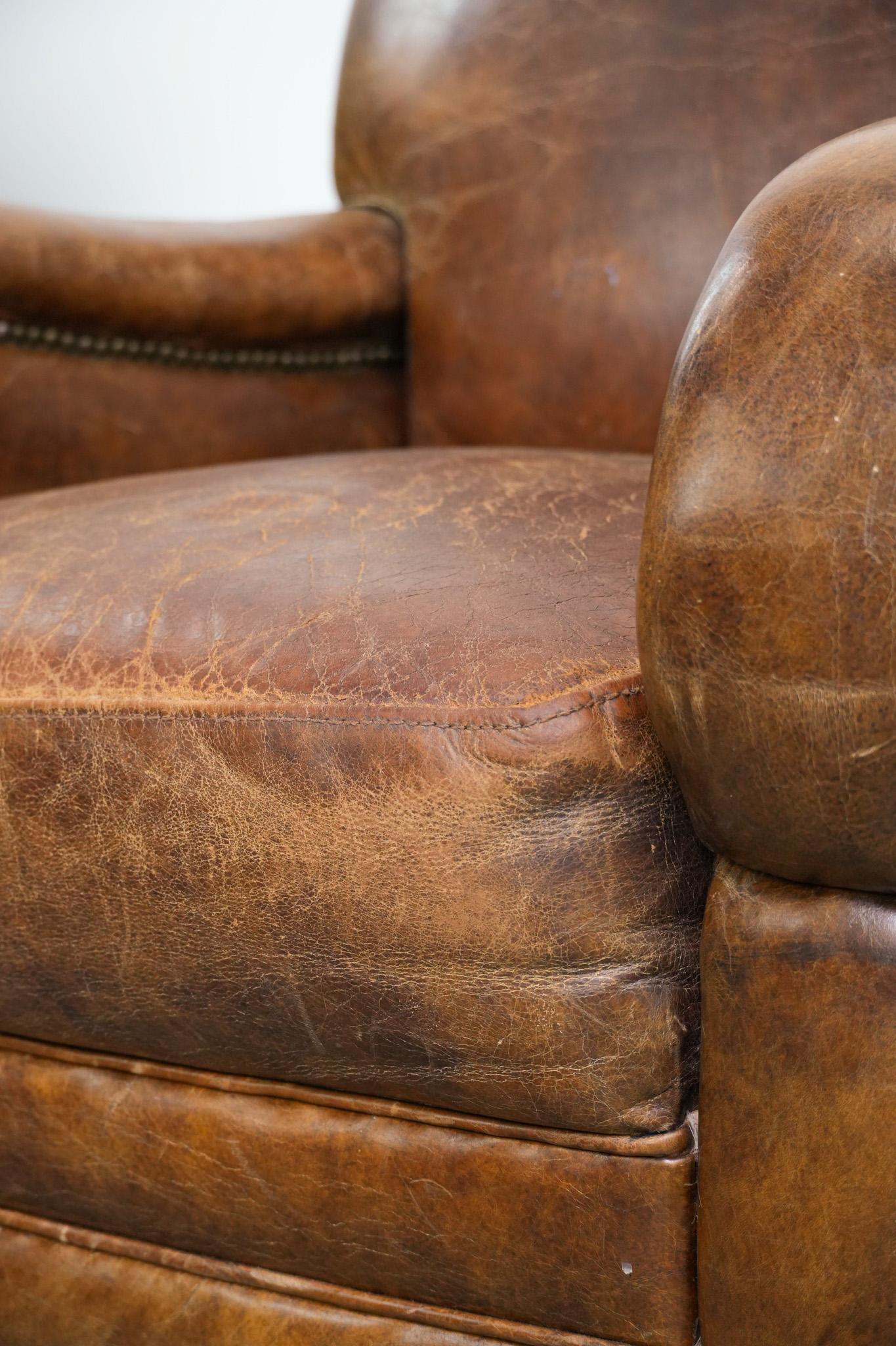 Vintage grained cowhide leather armchair with rounded shapes en vente 4
