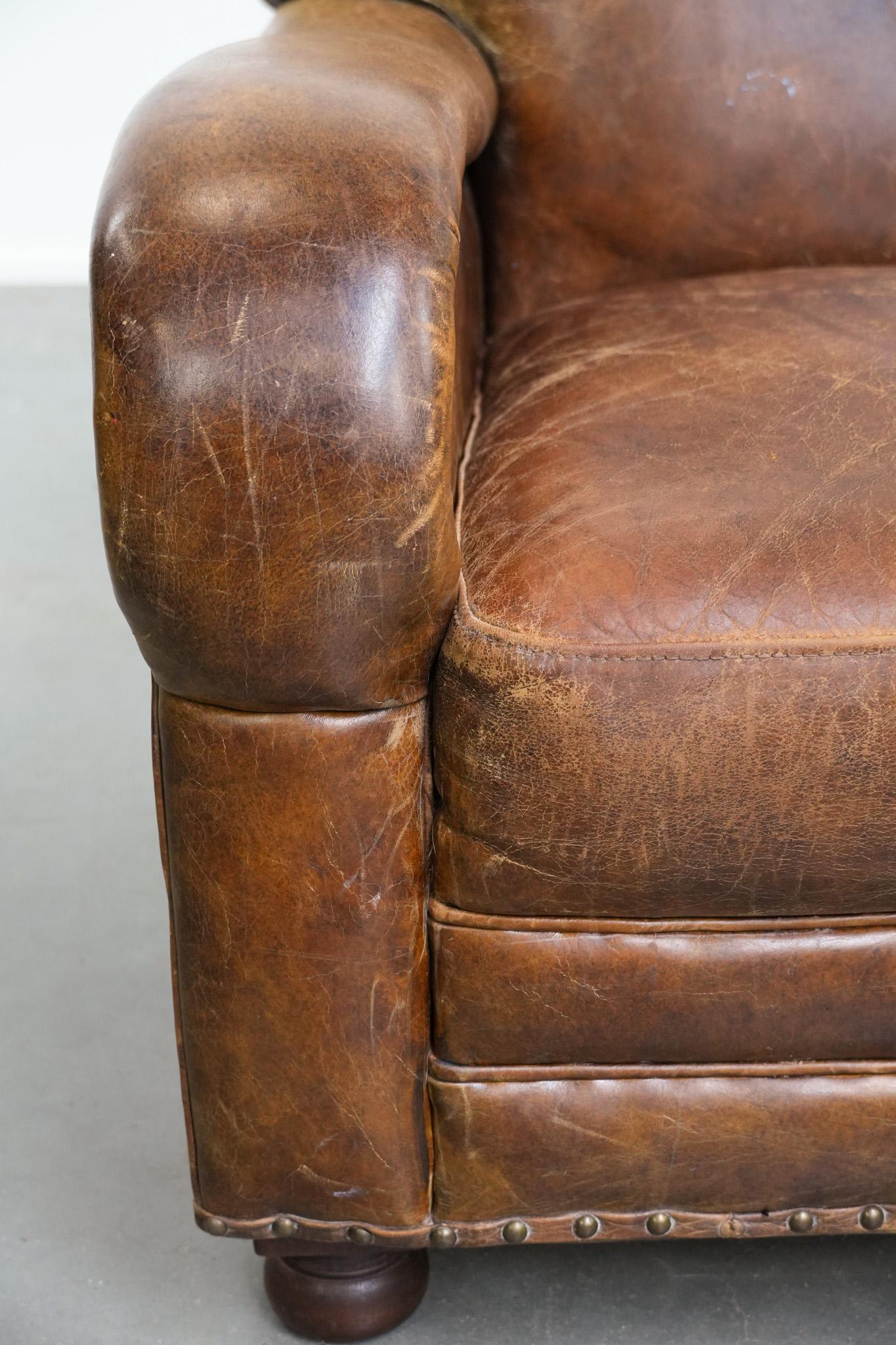 Vintage grained cowhide leather armchair with rounded shapes en vente 6
