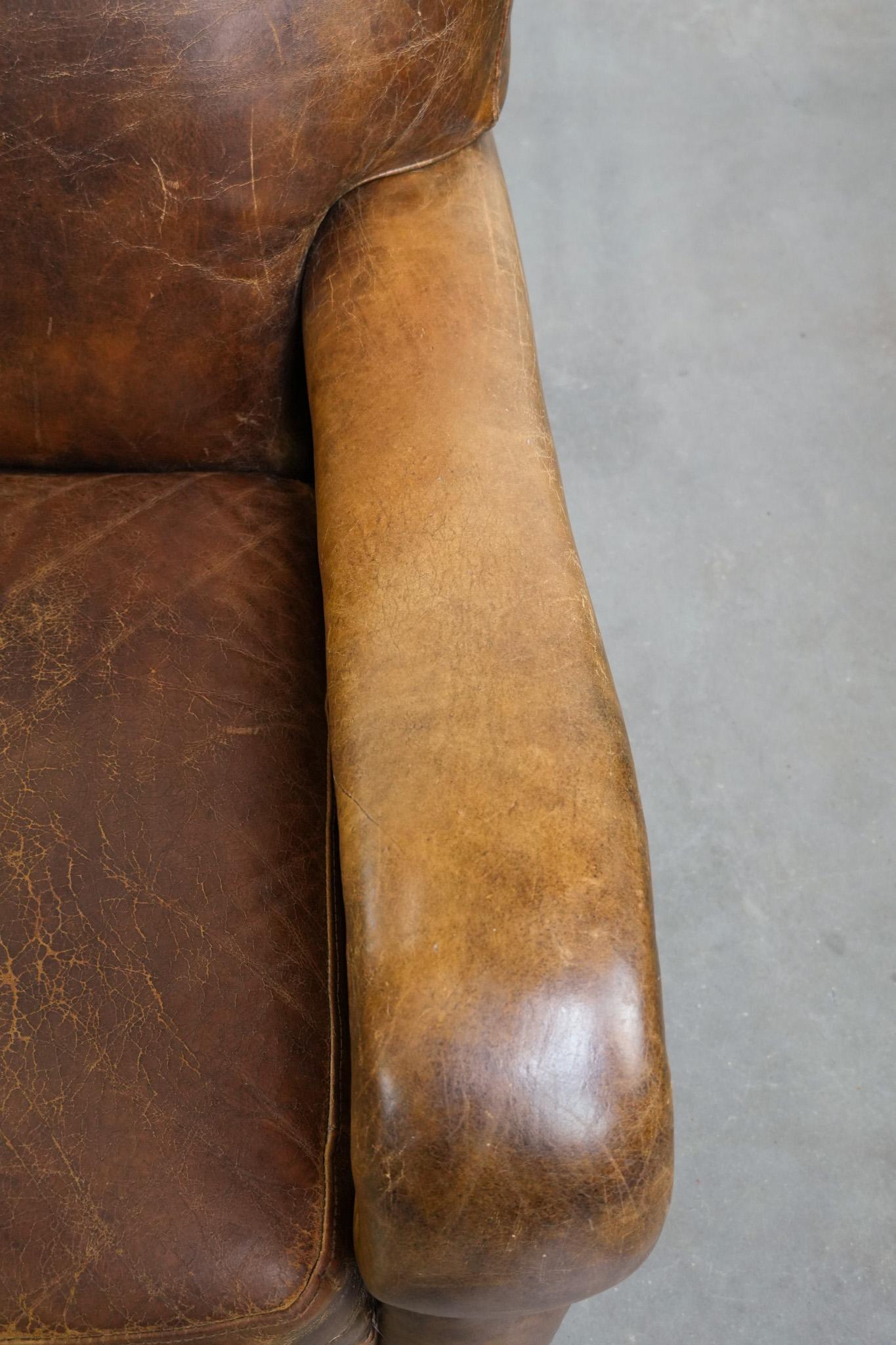 Vintage grained cowhide leather armchair with rounded shapes en vente 1