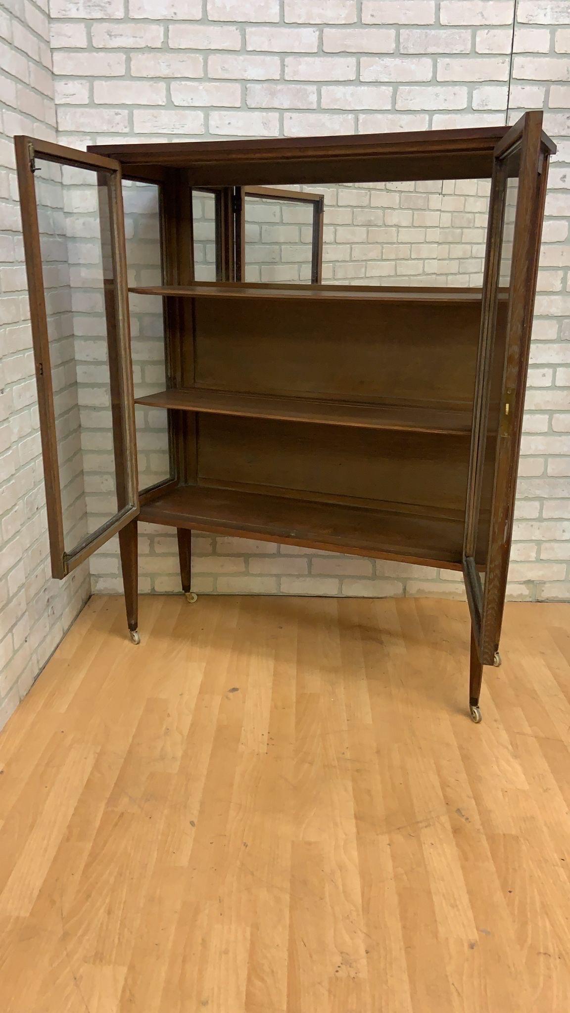 20th Century Vintage Grand Rapids Bookcase and Chair Co. Glass Front Display Cabinet on Legs