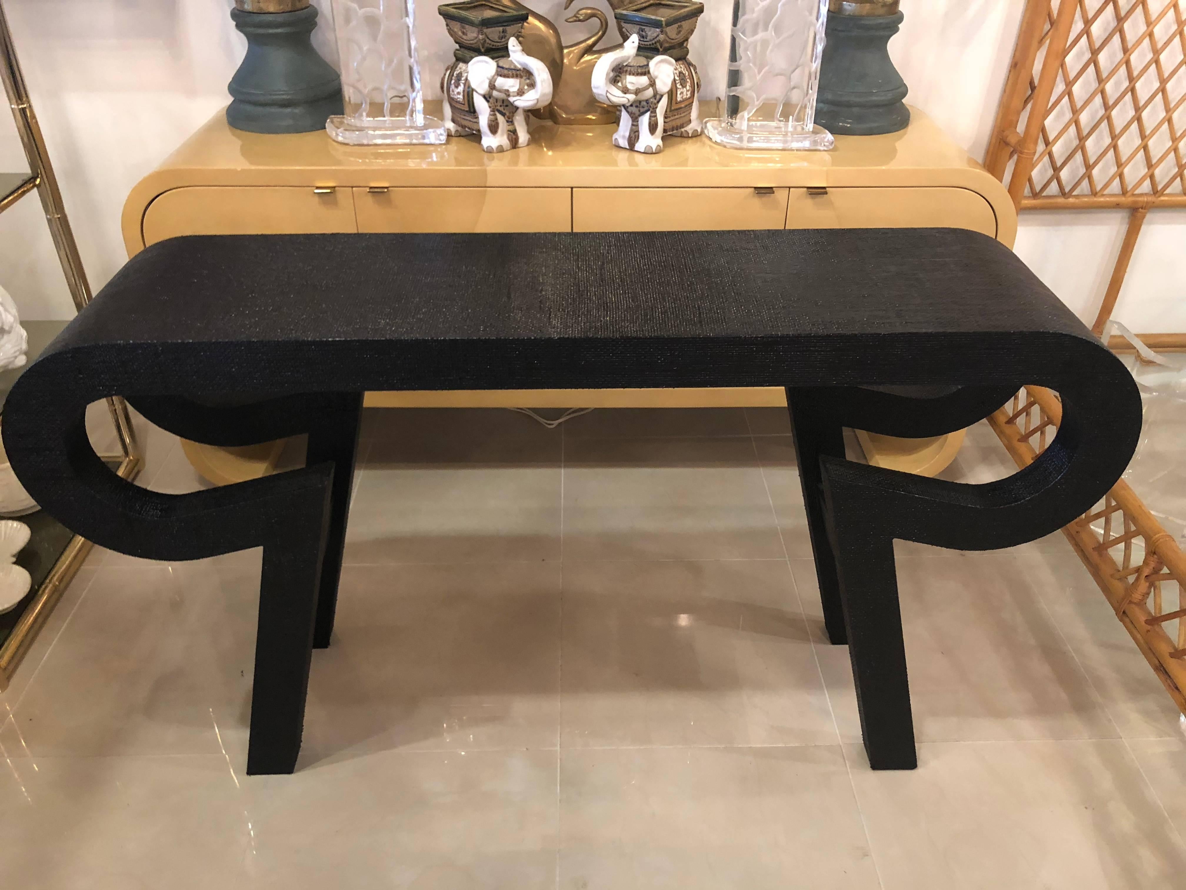 Vintage grasscloth console table lacquered in black. 