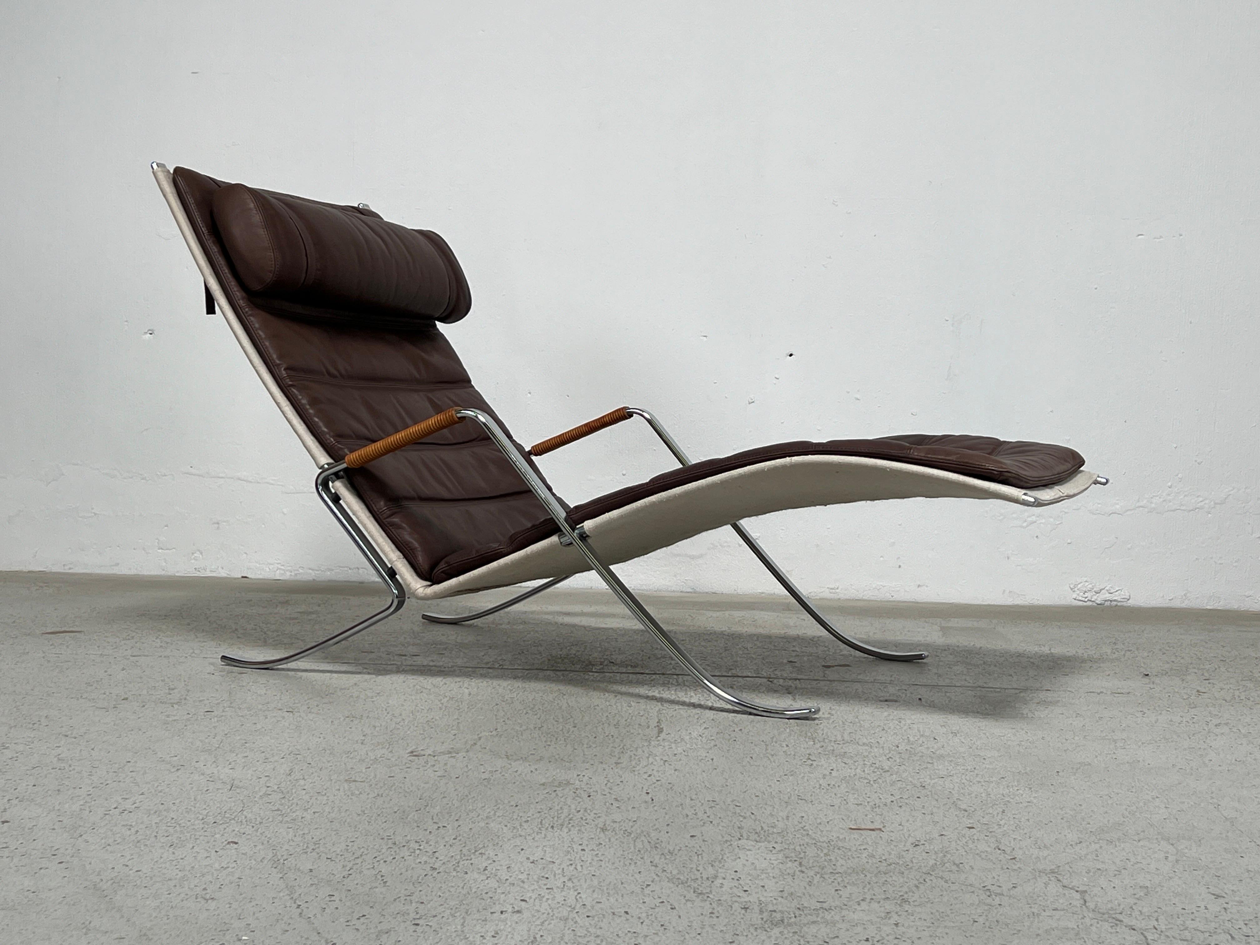 A vintage grasshopper chaise lounge by Preben Fabricius and Jørgen Kastholm for Kill International. 