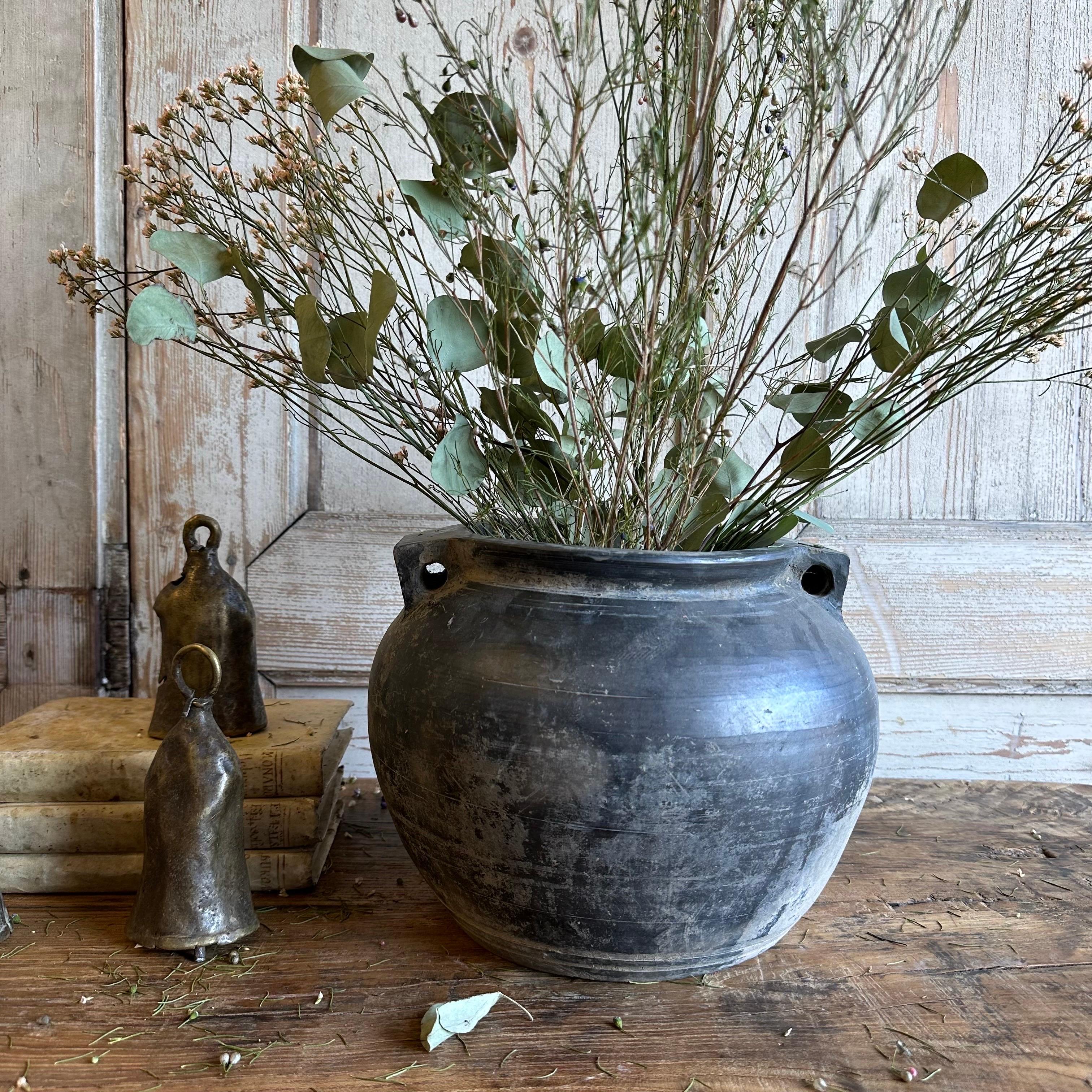 Vintage matte oil pots pottery rich in character, this vintage oil pot adds just the right amount of texture + warmth where you need it. Stunning matte finish with dark gray and light gray accents, with a washed antique look. Each piece is uniquely